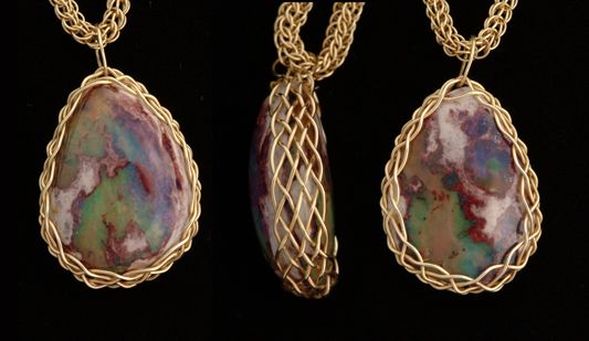 Mexican boulder opal, set with 7x16 bezel.  02-16-05