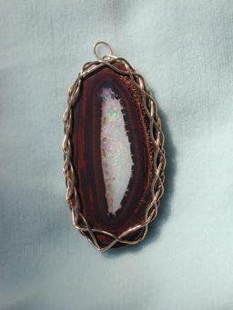 one side of large opal pendant