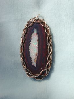 one side of big opal pendant