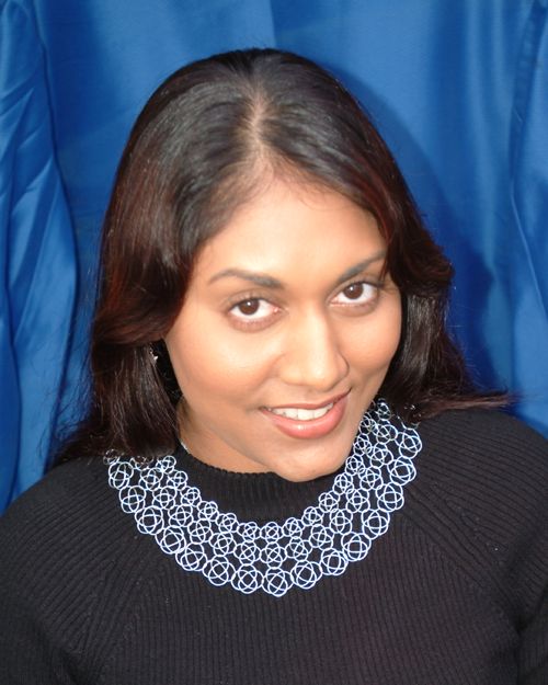 Silver graduated knotted chain mail necklace.