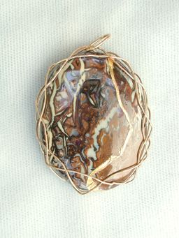 one side of opal pendant