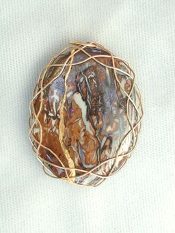 one side of opal pendant