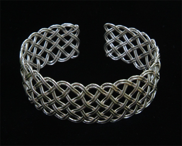 Front view of 7-lead sinnet bracelet with two strands.