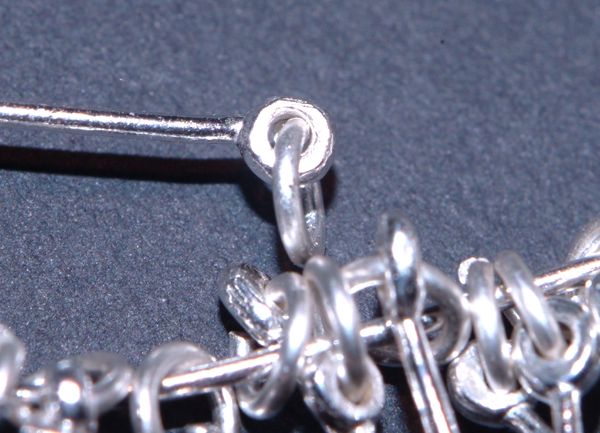 closeup of drilled headpin
