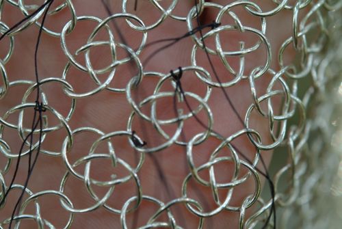 opened solder joints in knotted chain mail