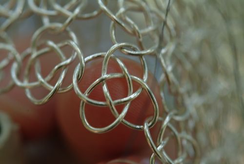 opened solder joints in knotted chain mail