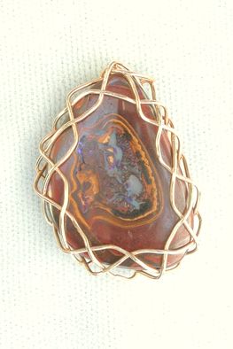 one side of opal pendant